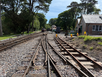 July 2025: View towards Woody Bay showing the new track layout with the carriage shelter road in the centre