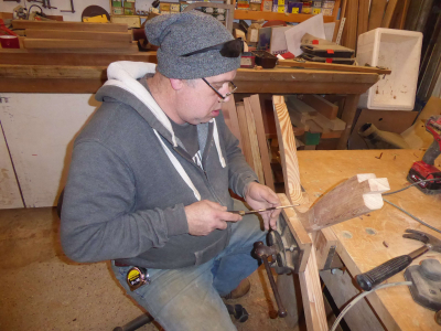 Dave Ely is seen working on seat parts for the 3rd class seats